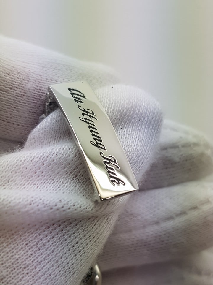 Initial engraving on platinum bracelet clasp