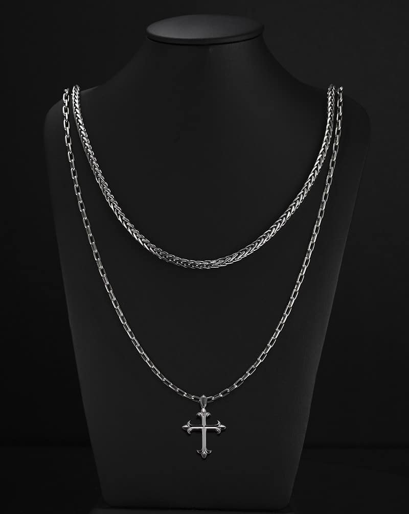 stack necklace platinum cuban chain and cable chain in byenzo jewelry with cross pendant