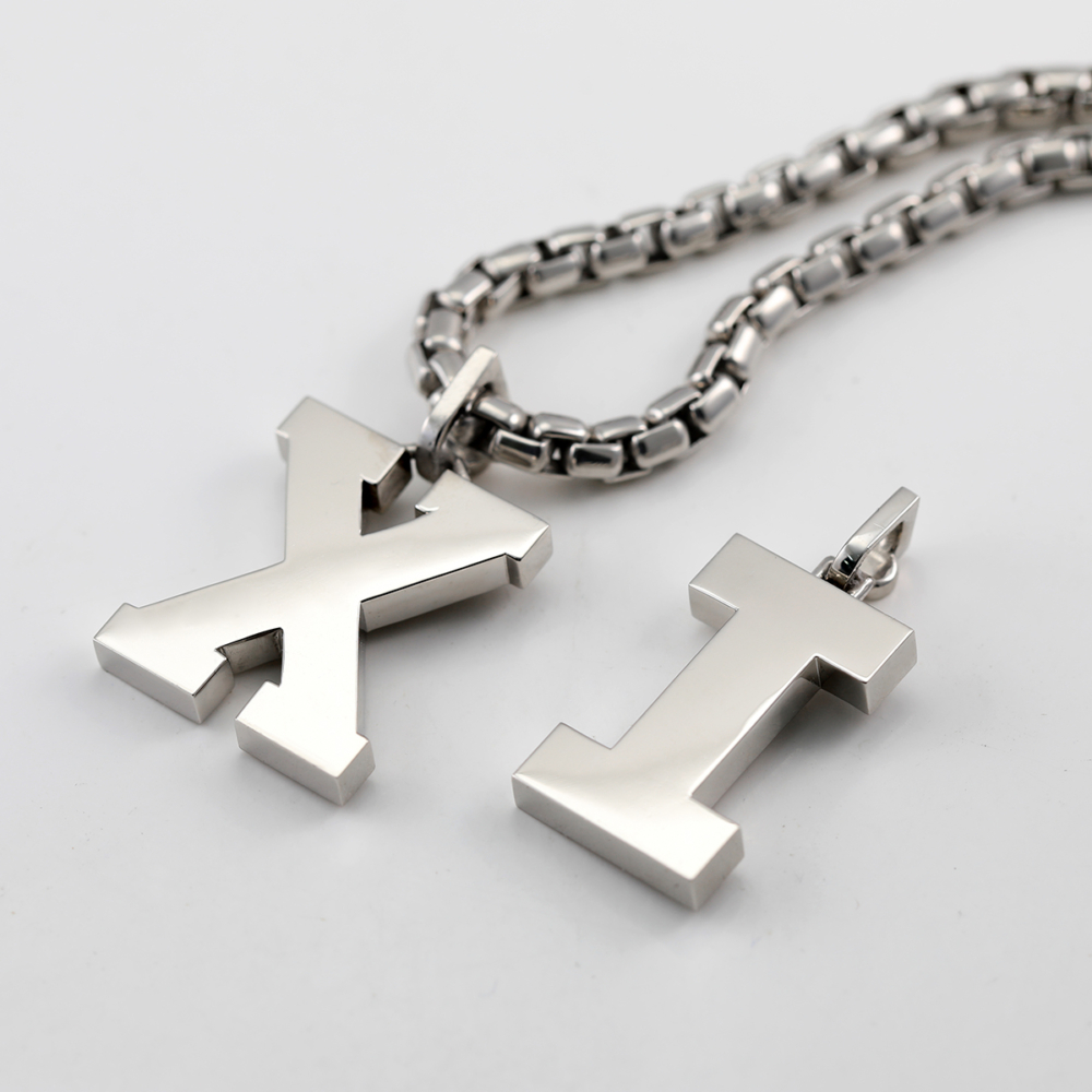 the alphabet pendant X and I made in Platinum 950