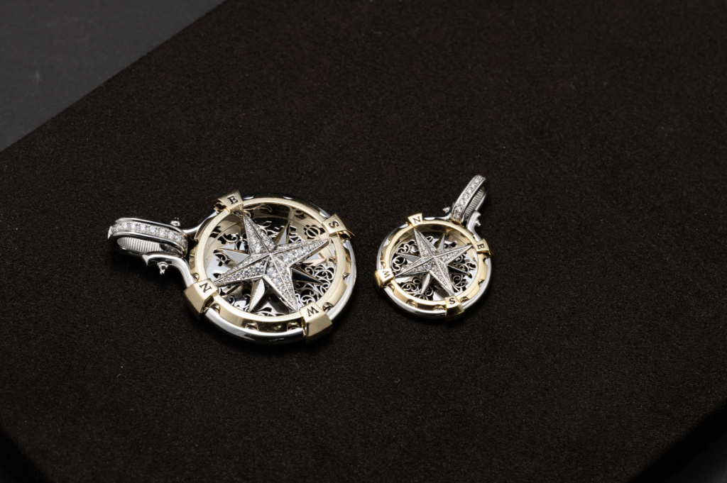 38mm compass pendant with diamond settings, made with pt950 platinum jewelry from byenzo jewelry