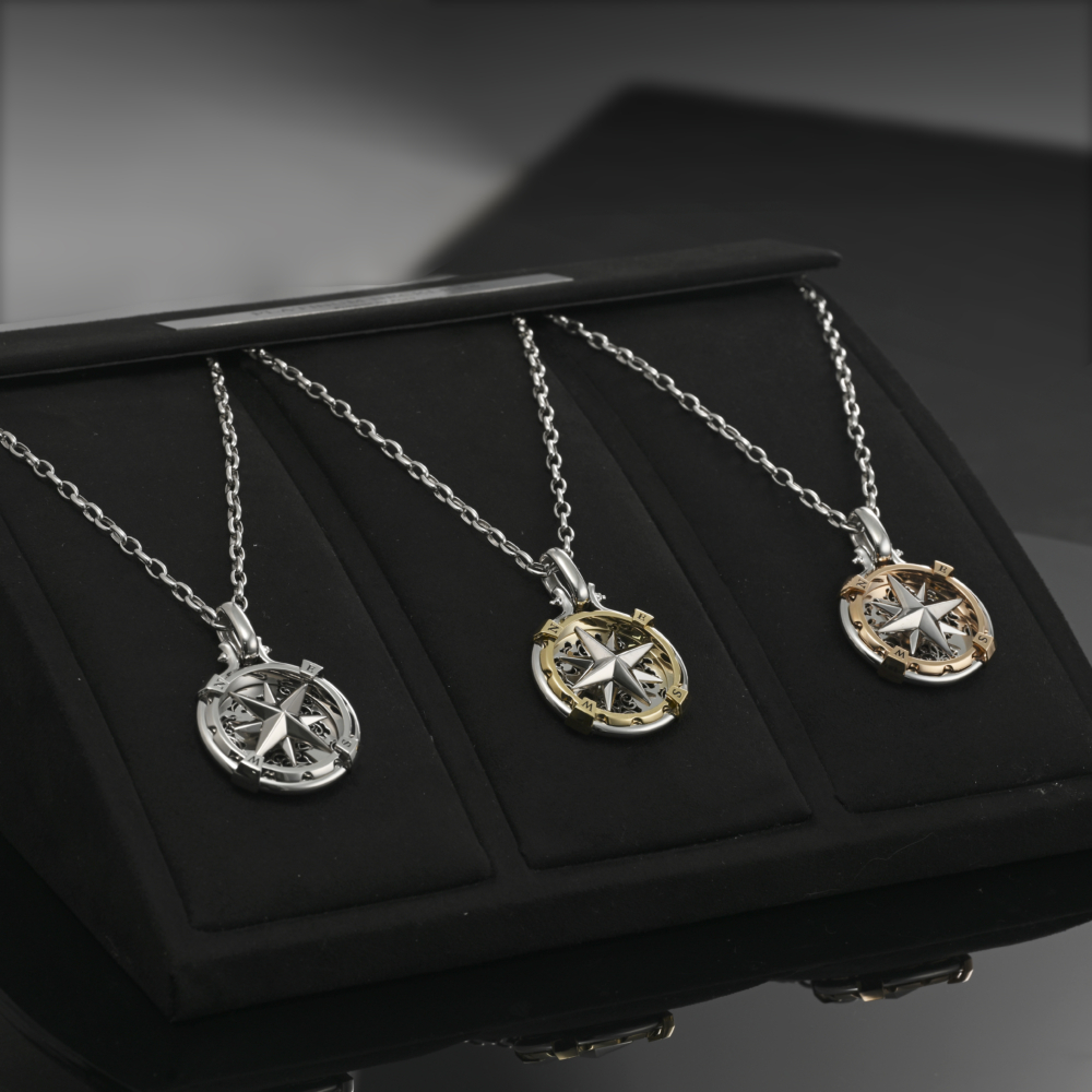 The platinum compass pendant with 18K gold, rose gold and full platinum from ByEnzo Jewelry