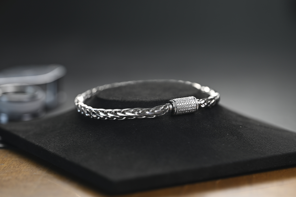 the platinum wheat chain with diamond settings, crafted by ByEnzo Jewelry, a men's bracelet jewelry